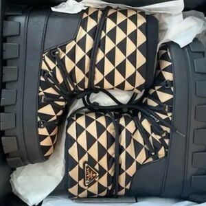 Prada Aprés Ski Black and Tan Winter Boots.